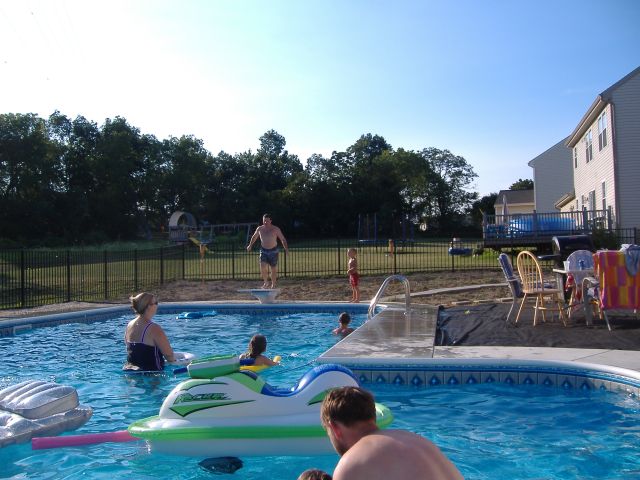 Ed on the diving pool, Lisa in the middle, John on the edge